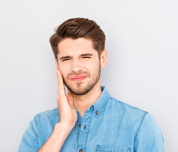 a man with tooth pain