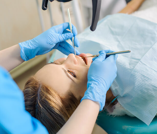 dentist examining a patient's teeth