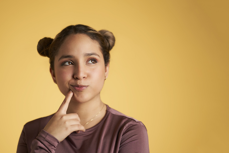 Woman wondering about advanced dental procedures.